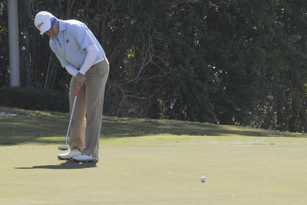 Alejandro Tosti putts during the 2015 SunTrust Gator Invitational on UF's Mark Bostick Golf Course.