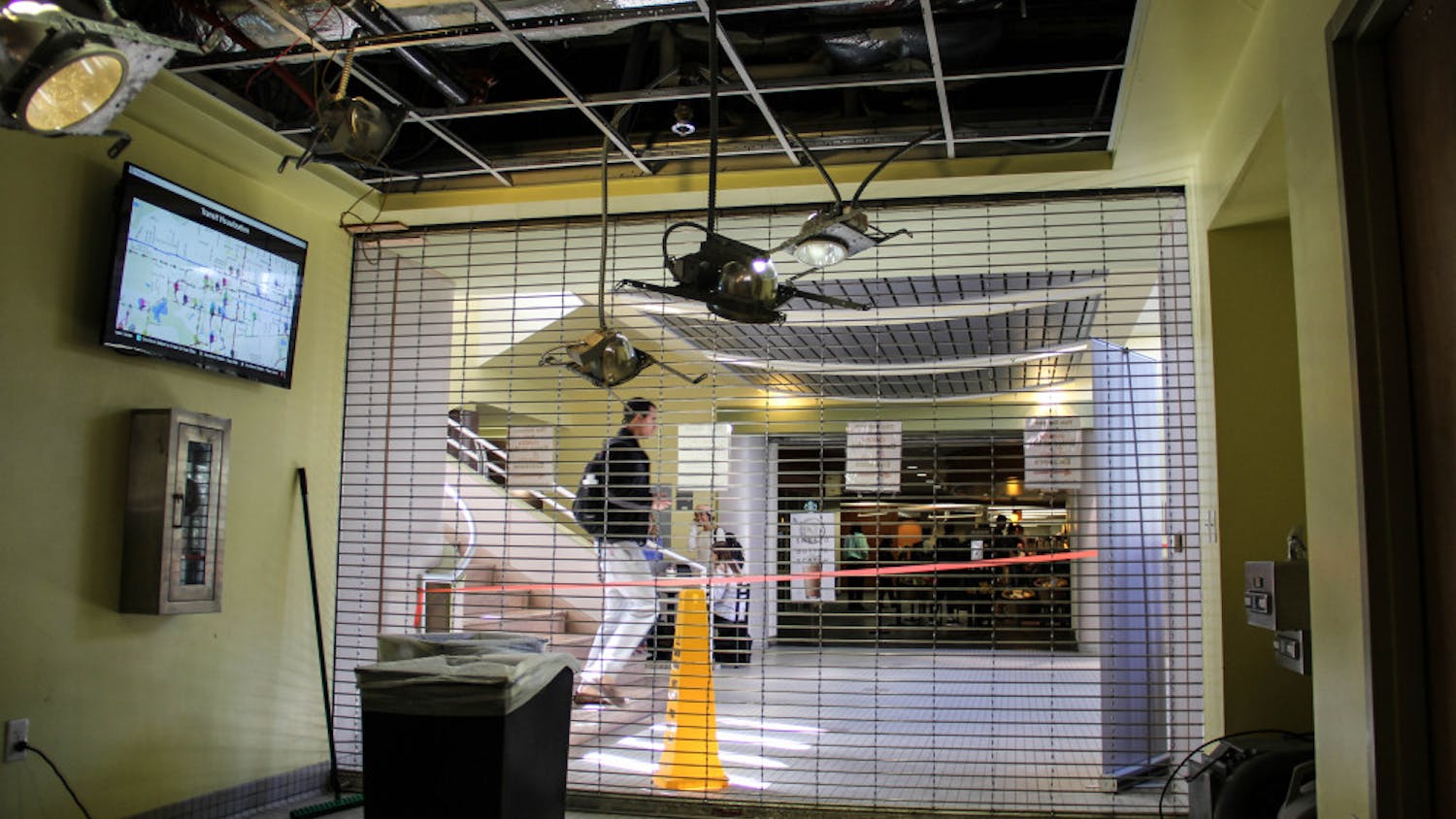 Students are blocked from the main walkway in the Hub after a pipe burst in between the entrance to the Hub and Chick-fil-A on Tuesday morning.