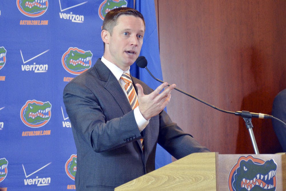 <p>UF men's basketball coach Mike White speaks at his introductory press conference on May 11 in the Gator Room at Ben Hill Griffin Stadium.</p>