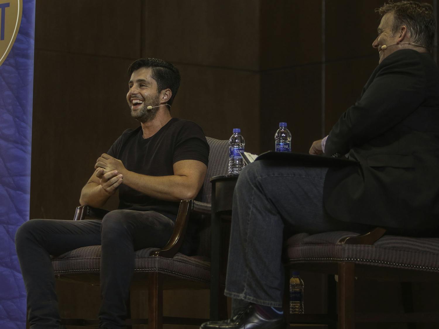 Josh Peck, the 32-year-old social media influencer and actor known for his starring role in the Nickelodeon show “Drake & Josh,” speaks to Ted Spiker, the chair of the department of journalism, Wednesday evening at the University Auditorium at the University of Florida. Peck first told the sold-out crowd of over 800 people about being married and becoming a dad. “I can’t believe I found someone to procreate with,” Peck joked.