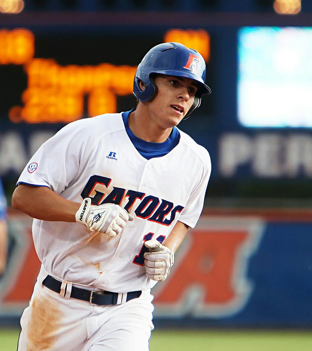 <p>UF outfielder Tyler Thompson rounds the bases after his homerun during the Gators' 13-9 win against Kentucky in McKethan Stadium on Saturday, May 17, 2009. (Andrew Stanfill / Alligator Staff)</p>