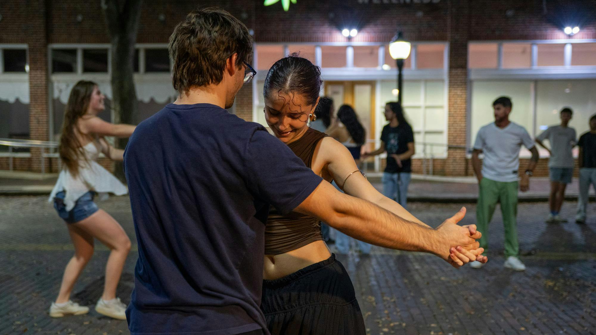 Gator Salsa meets up to dance outside The Bull, Thursday, March 5, 2026, in Gainesville, Fla.