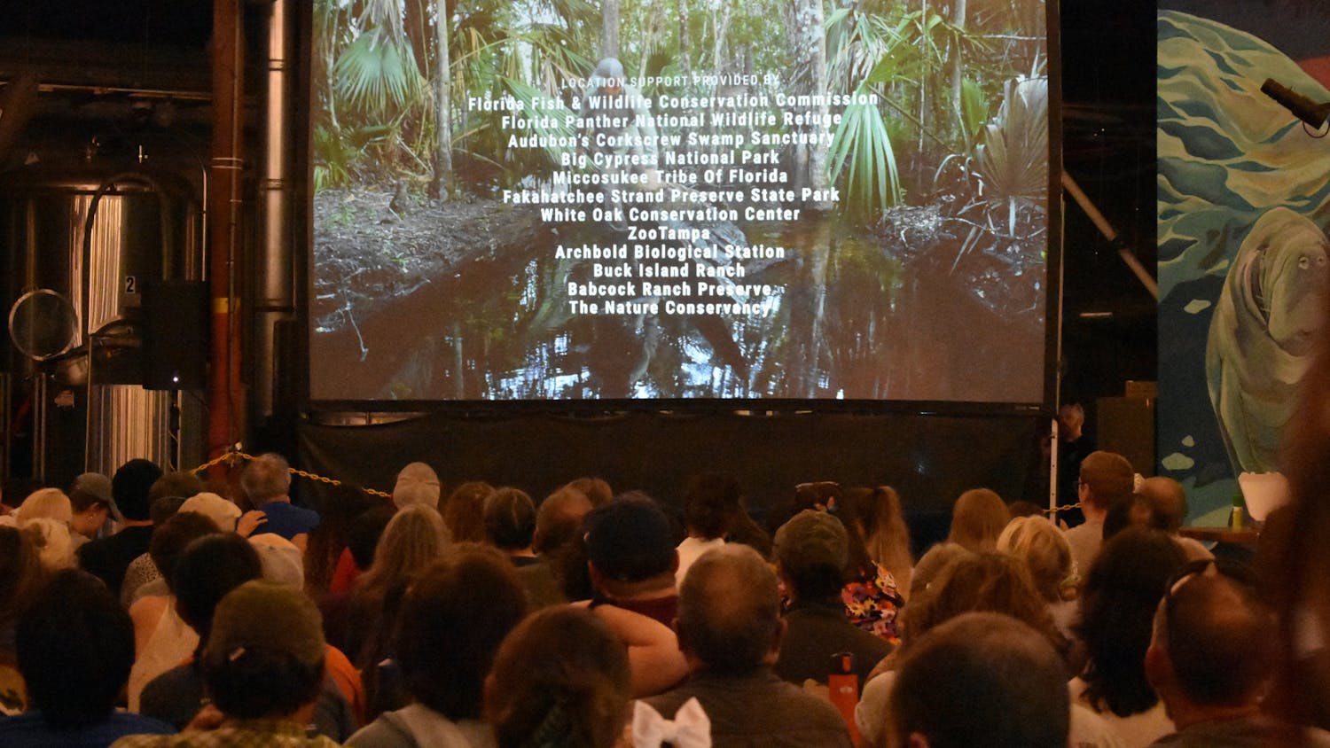 Individuals gather at First Magnitude Brewing Company Wednesday, March 1, 2023. 