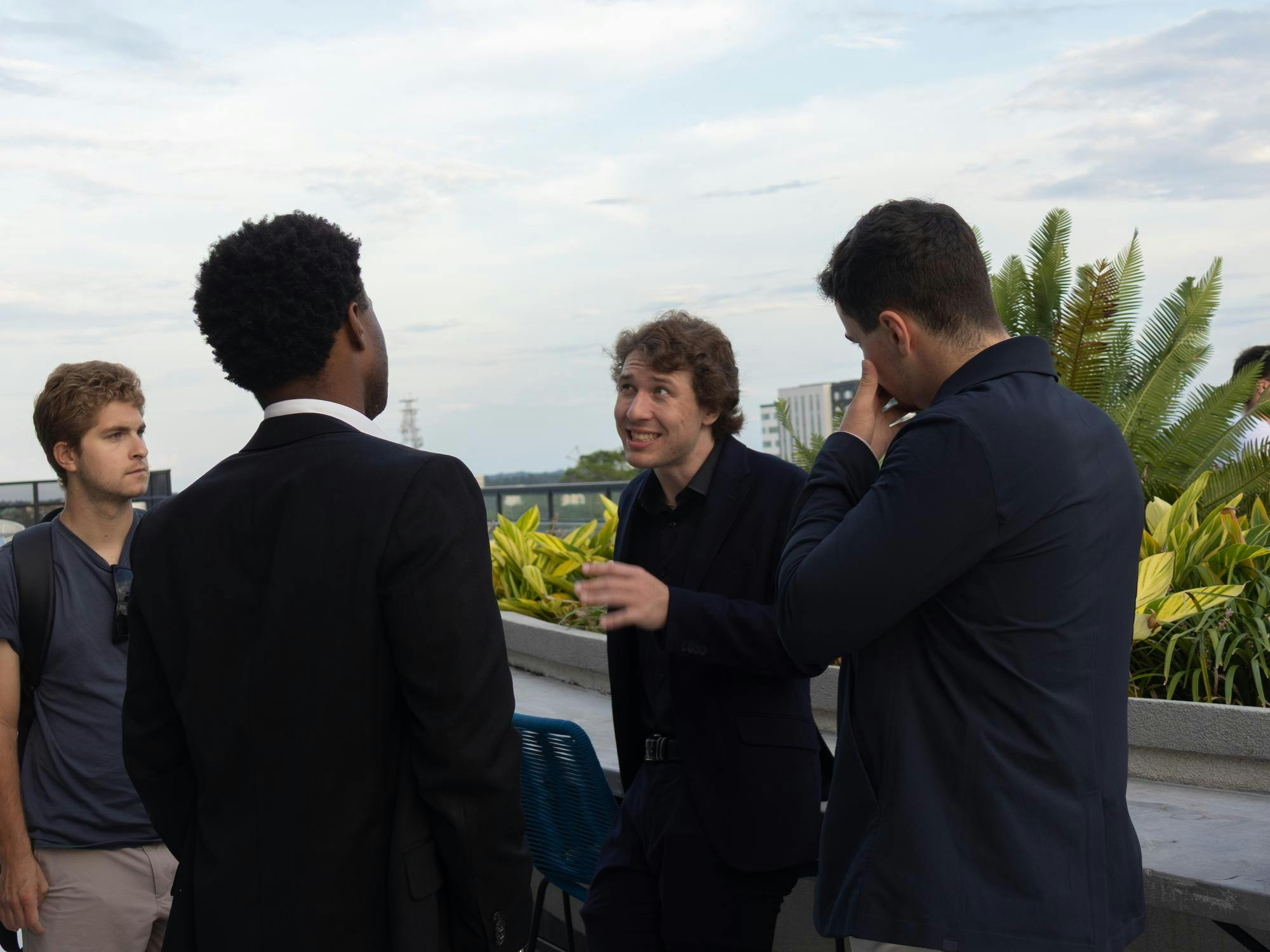 President of UF College Republicans Michael Andre speaks to members Ronald Patterson (left) and Davis Dunphy (right) at their first general body meeting after being disbanded by the university at Hub on 3rd’s rooftop lounge, Tuesday, Sept. 15, 2026 in Gainesville, Fla.