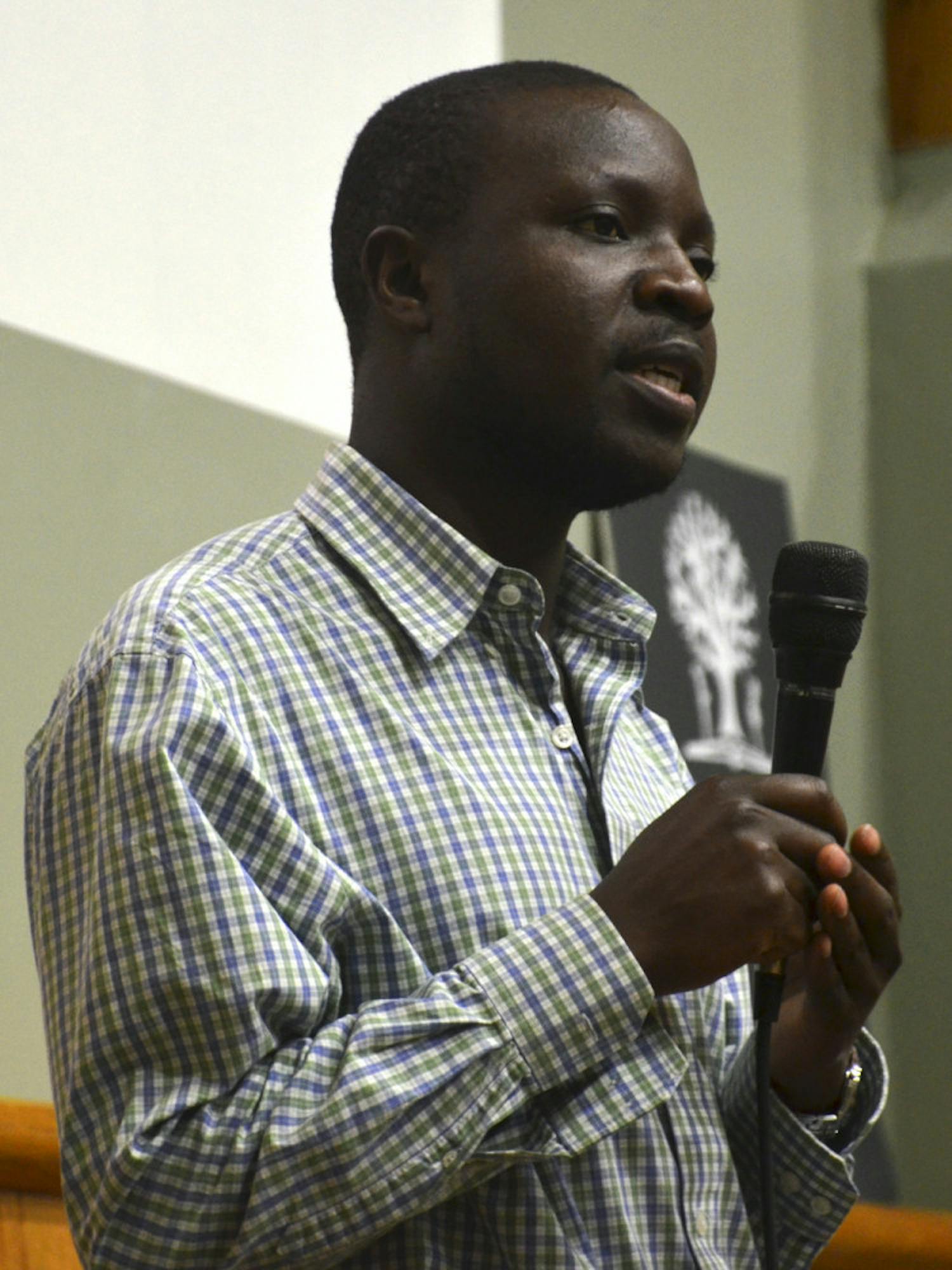 Twenty-nine-year-old author William Kamkwamba speaks at the Headquarters Library on Tuesday about his life in Malawi, Africa. At 14 years old, Kamkwamba built a windmill from scraps, providing electricity for his village.