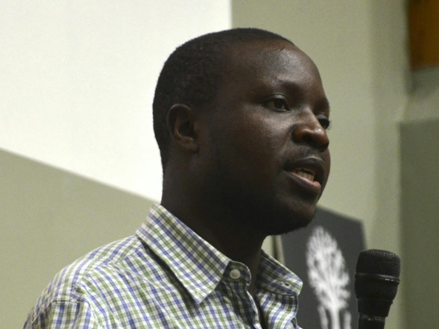 Twenty-nine-year-old author William Kamkwamba speaks at the Headquarters Library on Tuesday about his life in Malawi, Africa. At 14 years old, Kamkwamba built a windmill from scraps, providing electricity for his village.