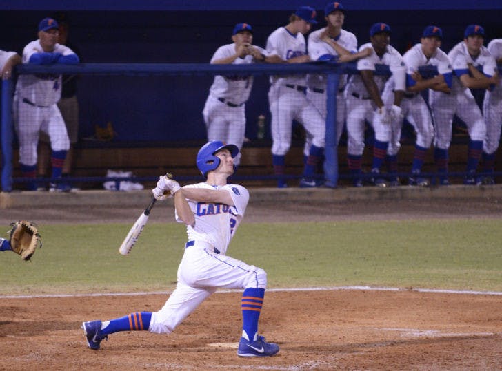 Sophomore Casey Turgeon hits a pop fly to first base in the bottom of the eighth inning against Florida Gulf Coast on Feb. 22. Turgeon’s batting average fell from .281 in 2012 to .269 this season.
