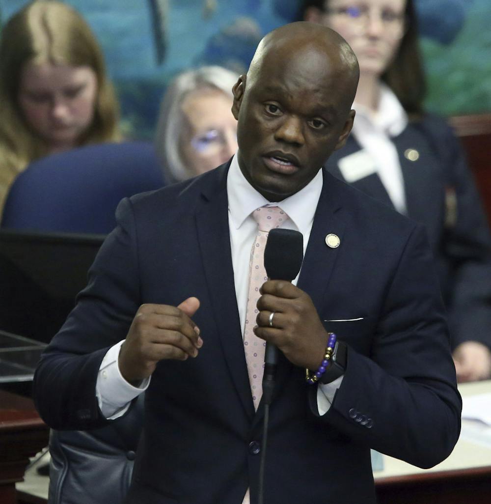 <p>FILE - In this Wednesday April 24, 2019 file photo, Rep. Kionne McGhee, D-Miami, debates the felon voting rights bill during session in Tallahassee, Fla. Following California's lead, Florida lawmakers are tackling NCAA rules that prohibit college athletes from reaping financial benefits from their prowess in the arena of big-money sports. A proposal by state House Democratic Leader Kionne McGhee is modeled after one signed into law last month by California Gov. Gavin Newsom that allows college athletes in the Golden State to sign endorsement deals and hire agents without endangering scholarships and their eligibility to participate in NCAA-sanctioned sports. (AP Photo/Steve Cannon, File)</p>