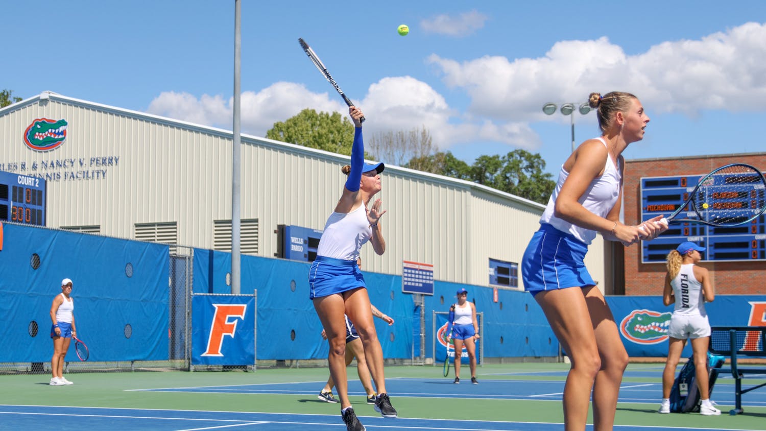Florida sophomores Bente Spee (left) and Alicia Dudeney (right) compete in their doubles match during the Gators' 4-1 win over the Michigan Wolverines Wednesday, March 22, 2023.