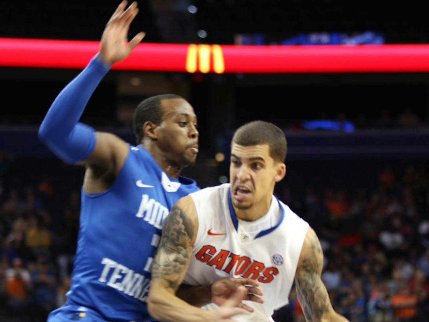 Guard Scottie Wilbekin (5) drives against Middle Tennessee in UF’s 66-45 win on Nov. 18 in Tampa.