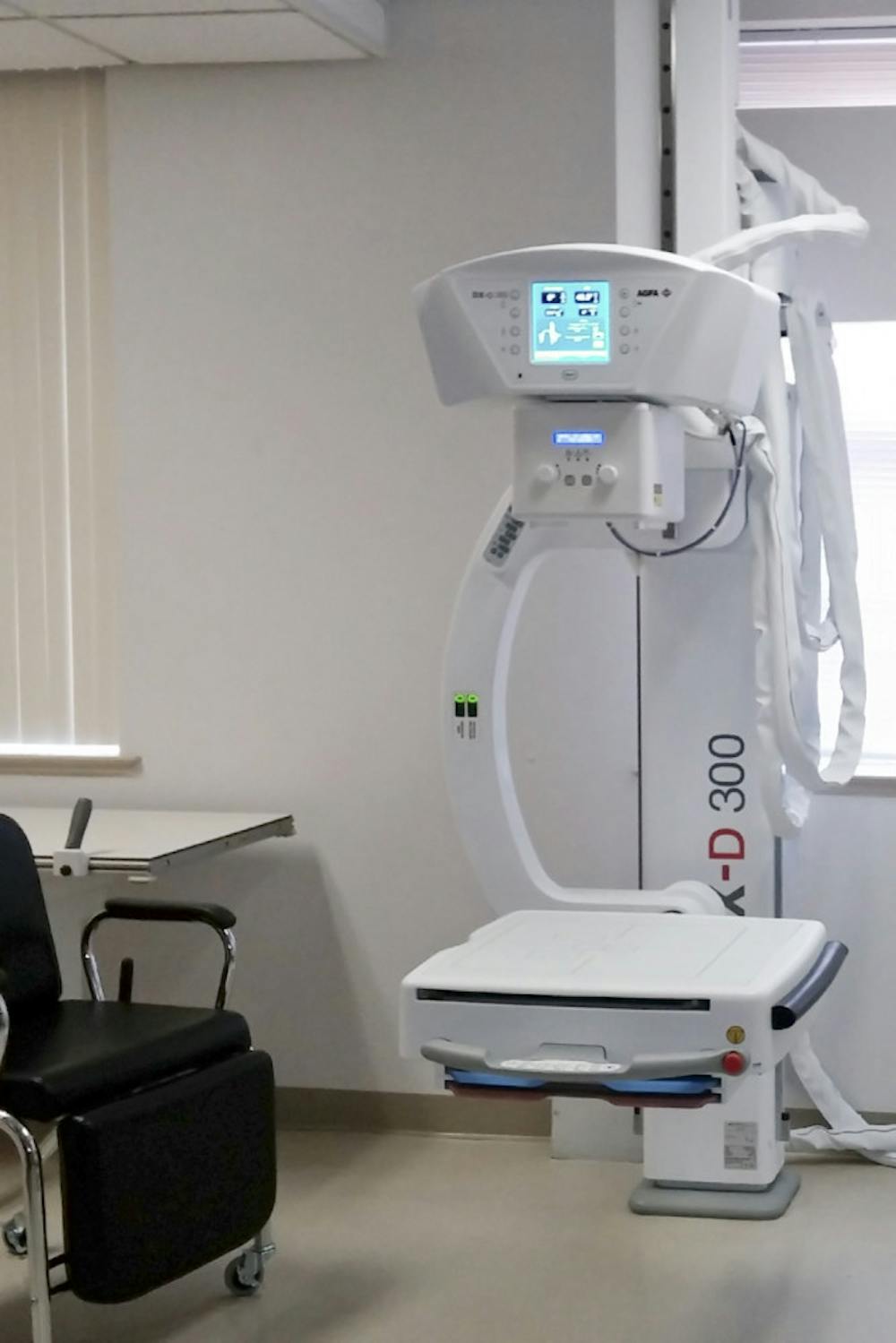 <p>Pictured is the new Digital Radiography X-ray machine located in UF Student Health Care Center. Costing approximately $150,000, the machine can produce thumbnail images of X-rays four to five seconds after the X-ray is taken.</p>