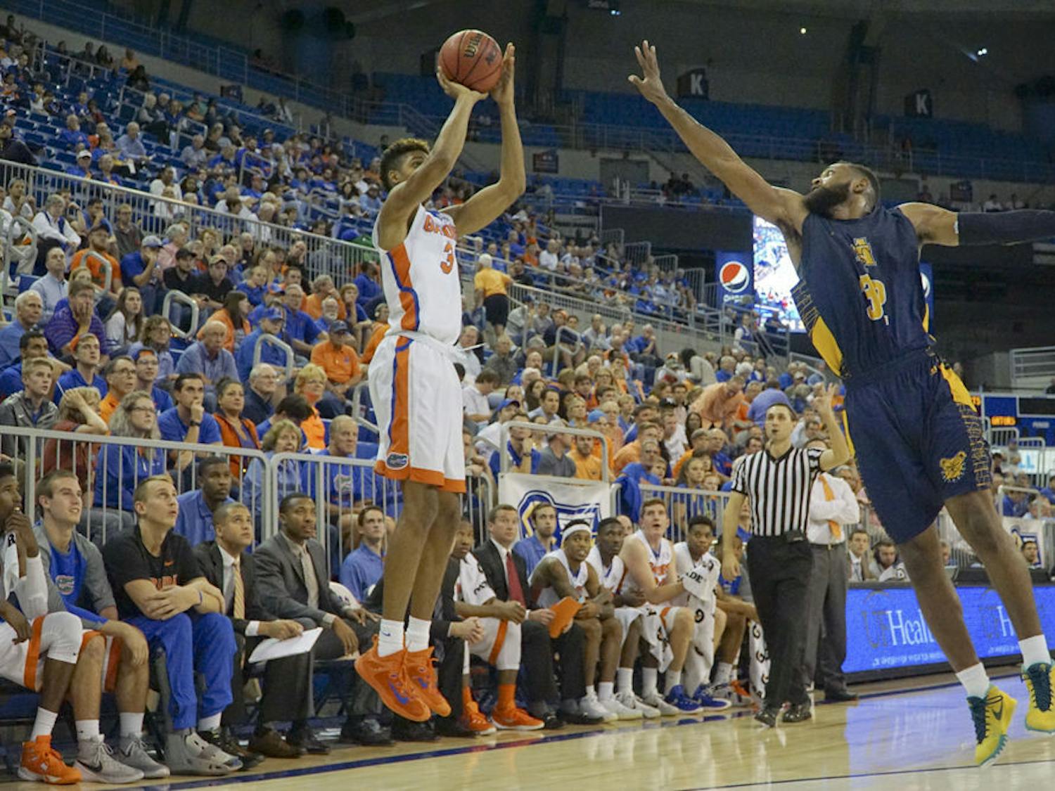 Devin Robinson shoots a three during Florida's 105-54 win against North Carolina A&T on Nov. 16, 2015, in the O'Connell Center.