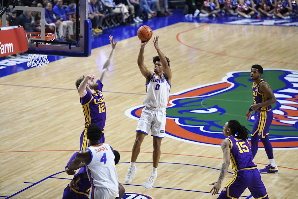 Gators men's basketball guard Zyon Pullin pulls up for a jump shot in the team's win against LSU on Tuesday, February 13, 2024. 