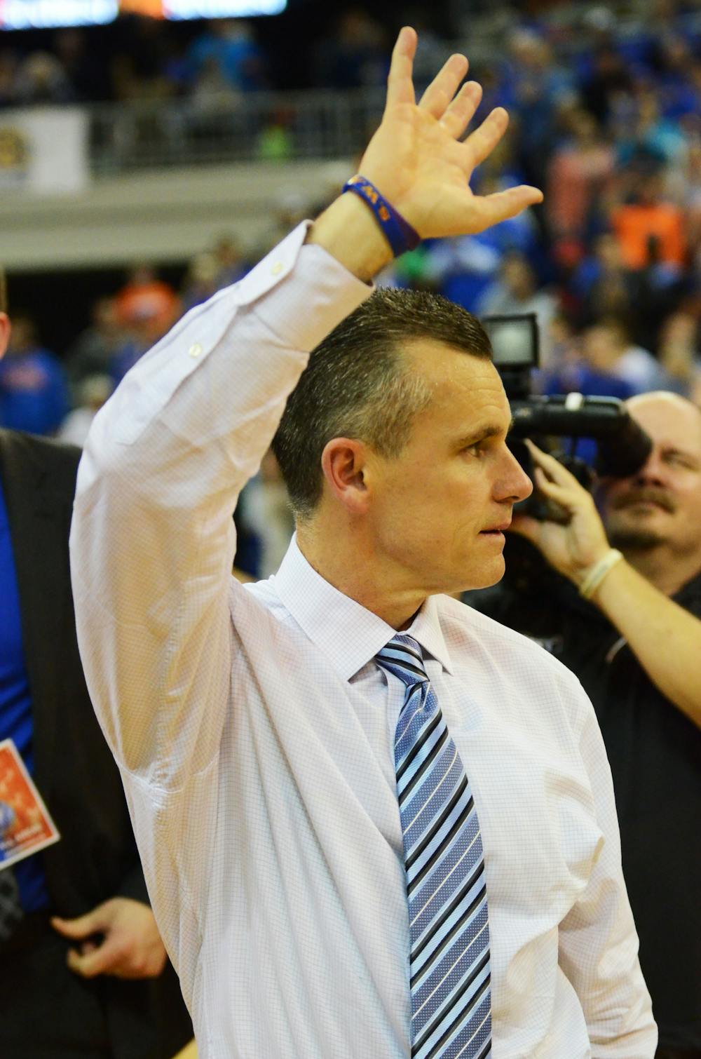 <p>Billy Donovan waves to the O'Connell Center crowd following Florida's 66-49 win against Tennessee on Feb. 28.</p>