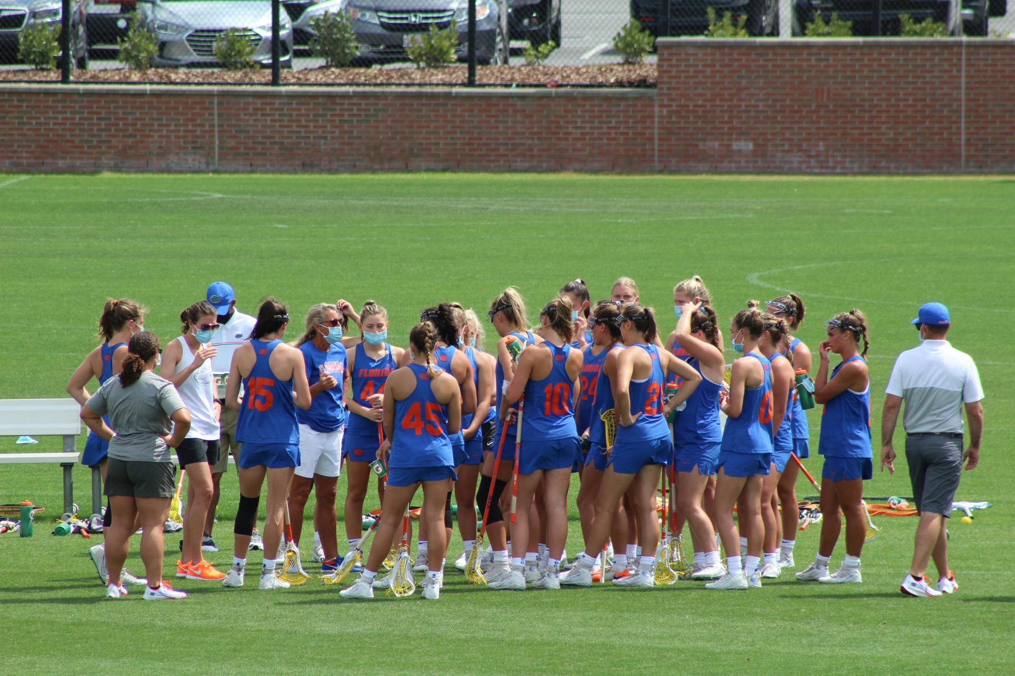 The Gators huddle in a game against Cincinnati March 28 