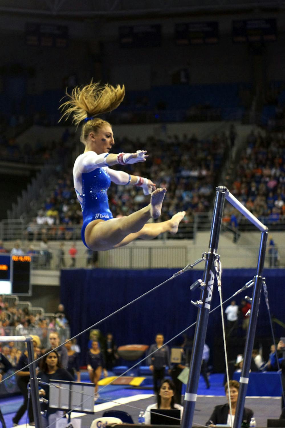 <p>UF's Alex McMurtry performs on bars during Florida's win over UCLA on Jan. 15, 2016, in the O'Connell Center. </p>