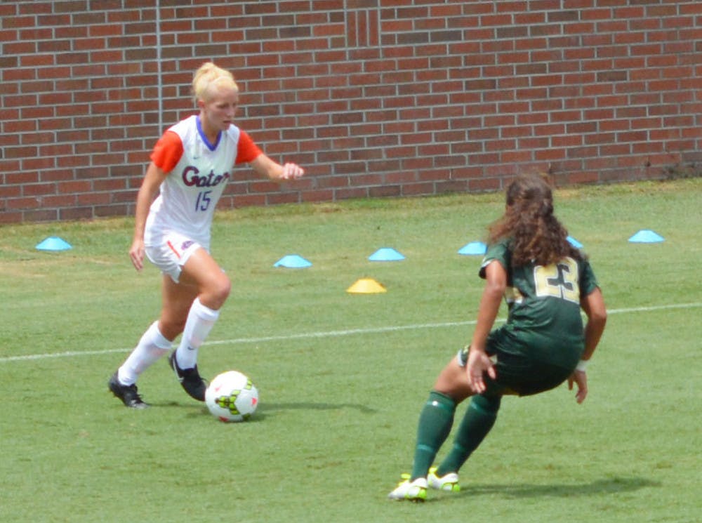 Tessa Andujar (15) dribbles the ball during Florida's 2-0 win against South Florida on Sunday at Donald R. Dizney Stadium.