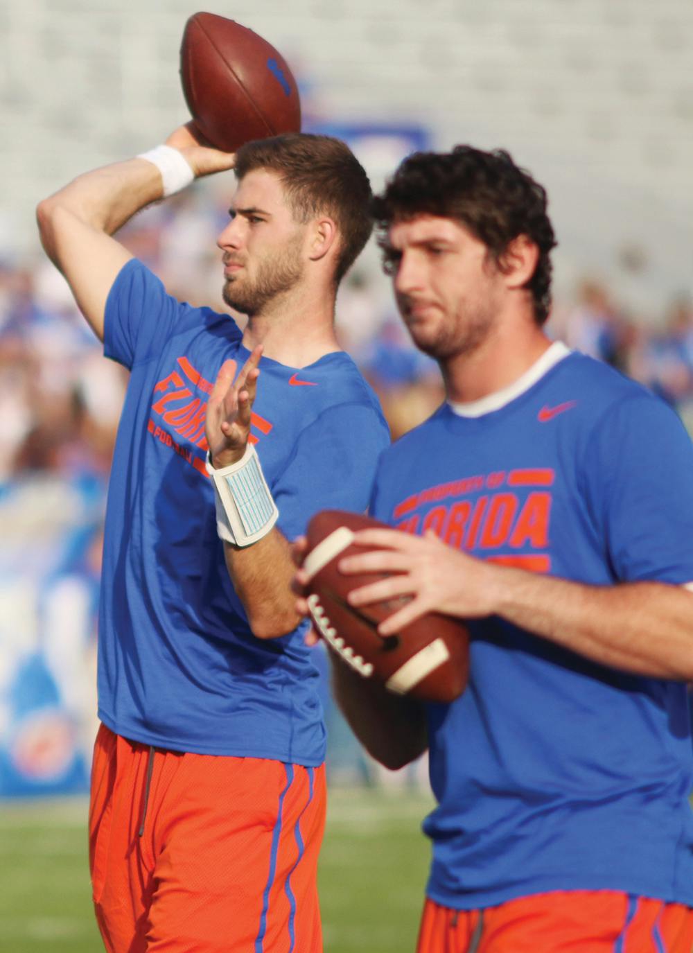 Redshirt junior quarterback Christian Provancha, left, warms up with redshirt freshman Skyler Mornhinweg, right, prior to Florida's 24-7 victory against Kentucky on Sept. 28 at Commonwealth Stadium in Lexington, Ky.