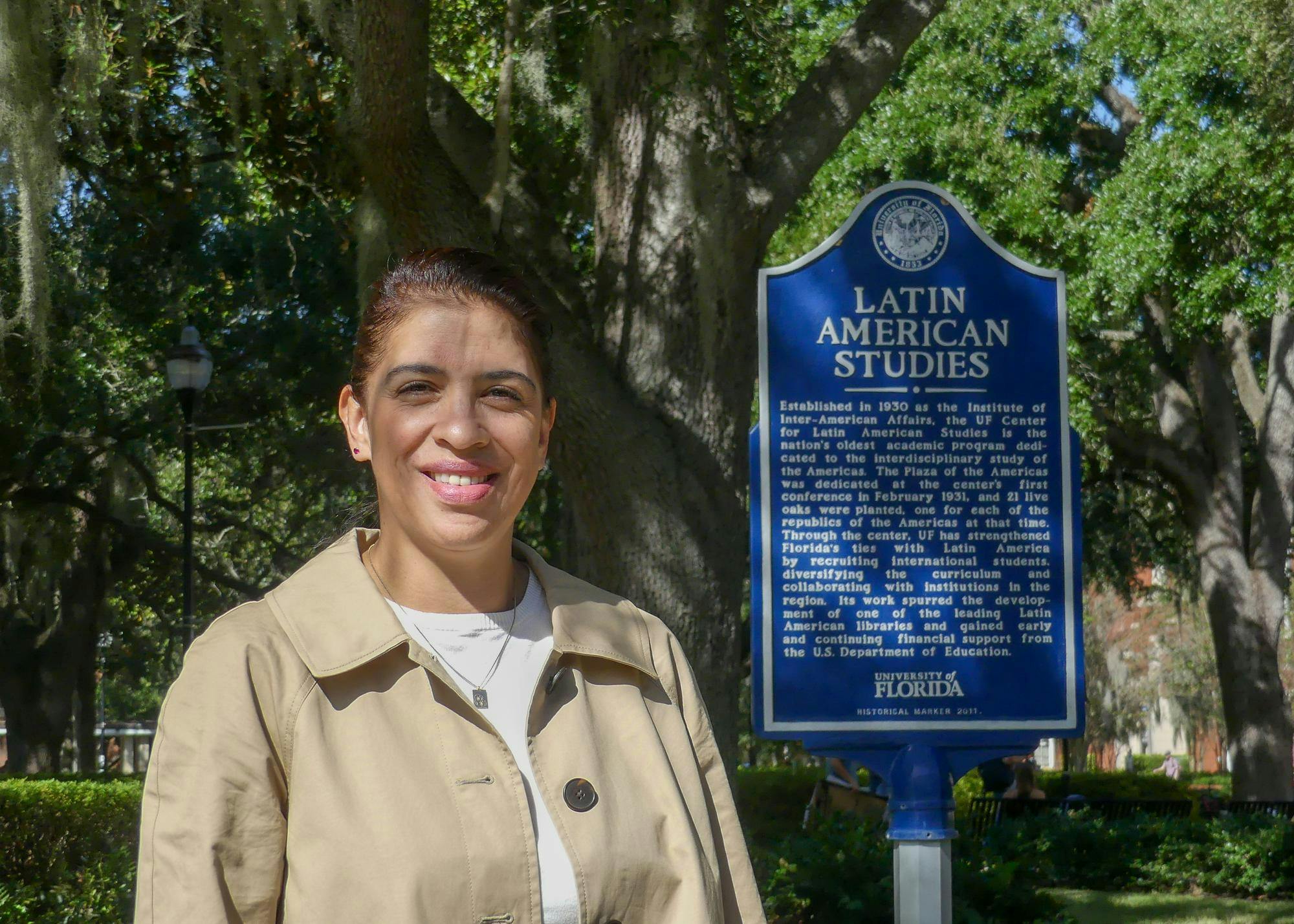 Eva Siomara Sosa stands on the Plaza of the Americas in front of the Latin American studies display Thursday, Oct. 23, 2025.