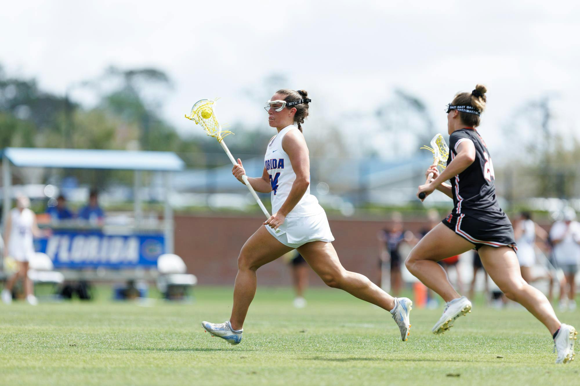 Florida midfielder Gabbi Koury (24) runs with the ball during the second quarter of an NCAA women’s lacrosse gmae against Mercer, Saturday, March 07, 2026, in Gainesville, Fla.