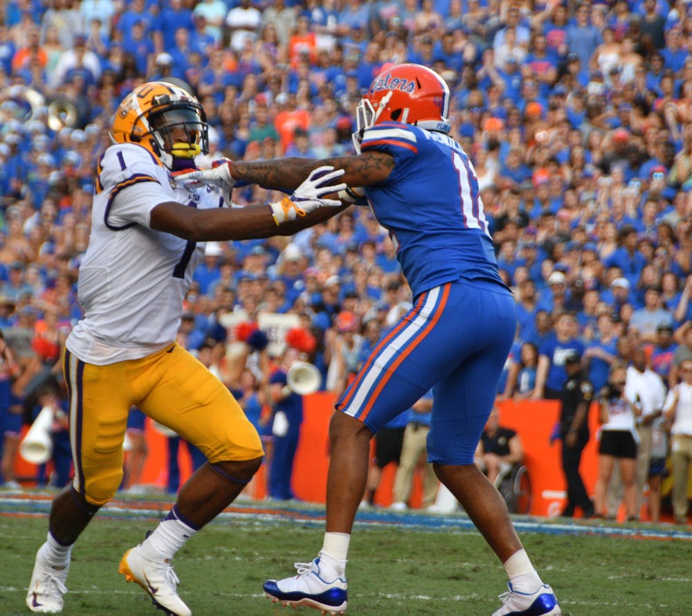 Cornerback C.J. McWilliams (right) earned the first start of his career Saturday against LSU. He gave up a pair of catches on the Tigers' first drive and was replaced by freshman Trey Dean later on.
