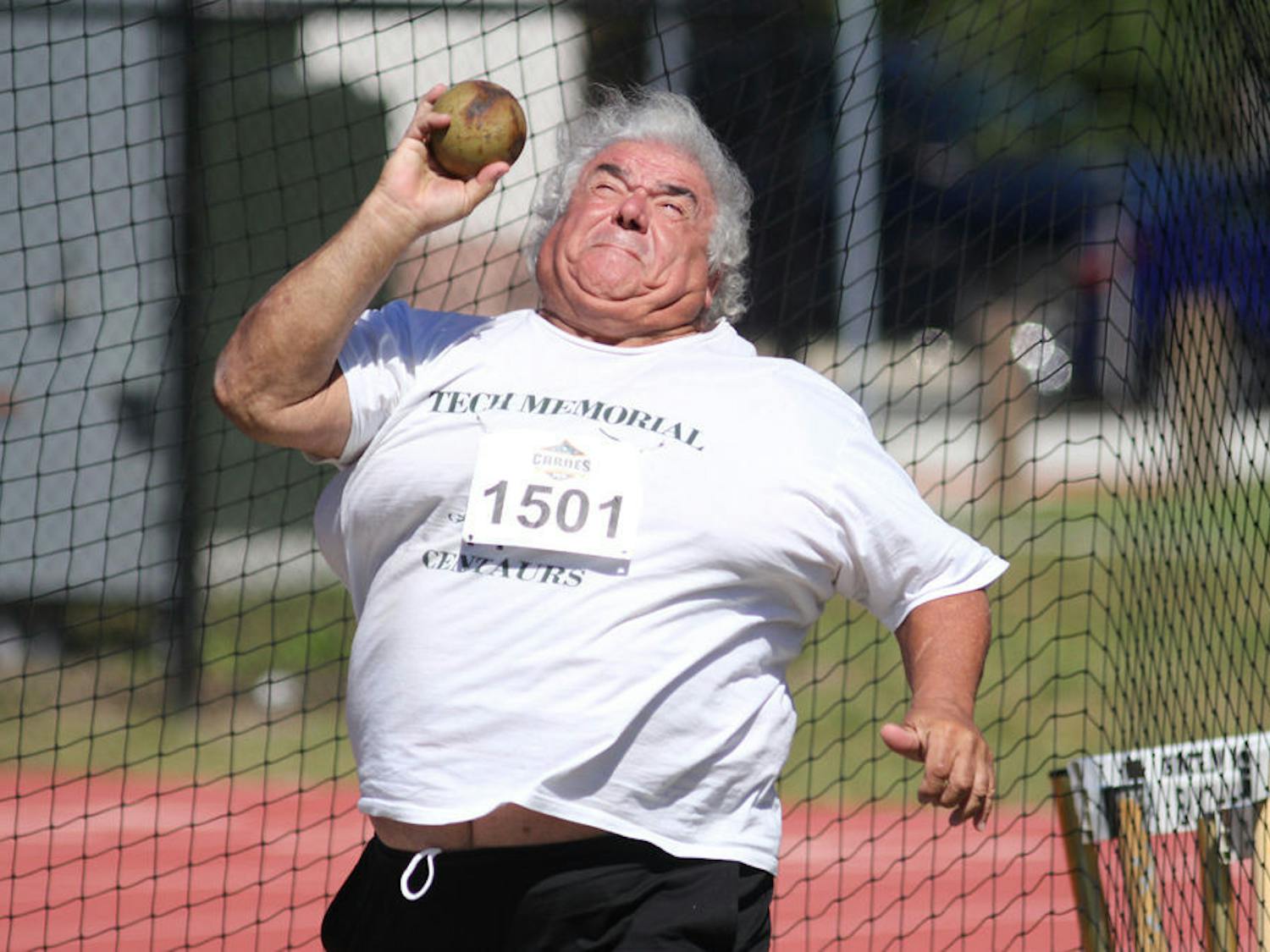 Joe Abal, 65, competes in the shot put competition at the 14th Annual Gainesville Senior Games on Sunday. Abal came in second place in his age category, 65 to 70, with a throw of 24 feet and 1 inch.