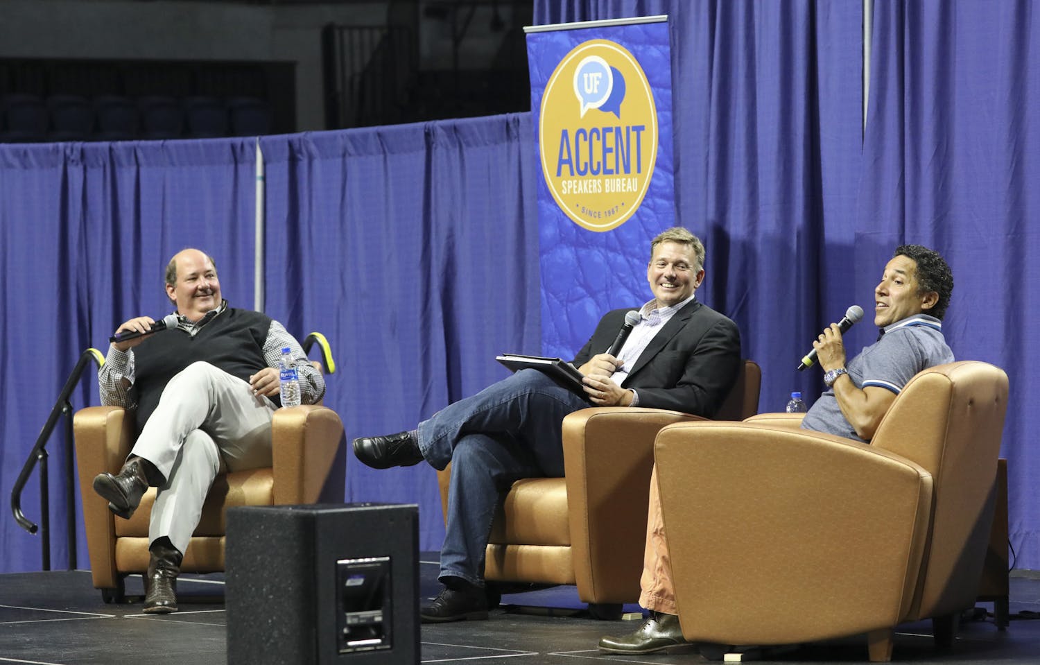 UF journalism professor Ted Spiker (center) moderates a conversation with ACCENT Speakers Bureau guests Brian Baumgartner (left) and Oscar Nuñez (right) on Wednesday, June 30, 2021. The event is the first fully in-person Accent event since October 10, 2019, before the COVID-19 pandemic. 