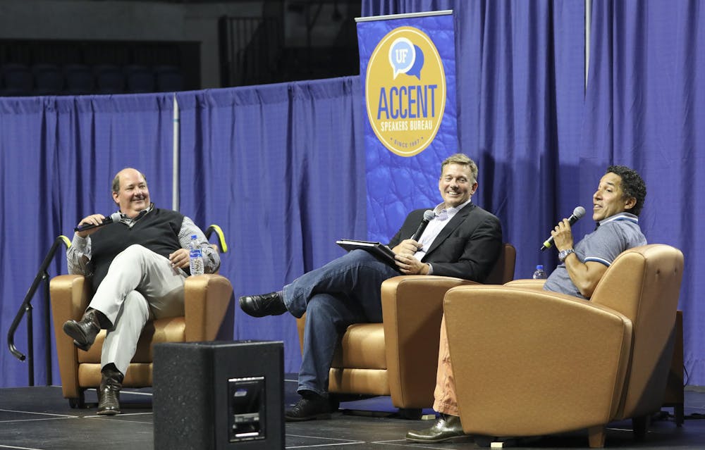 <p>UF journalism professor Ted Spiker (center) moderates a conversation with ACCENT Speakers Bureau guests Brian Baumgartner (left) and Oscar Nuñez (right) on Wednesday, June 30, 2021. The event is the first fully in-person Accent event since October 10, 2019, before the COVID-19 pandemic. </p>