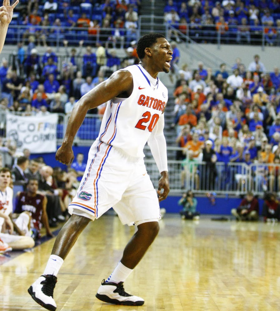 Freshman guard Michael Frazier II (20) reacts after a play during Florida’s 75-36 win against South Carolina on Jan. 30 in the O’Connell Center.