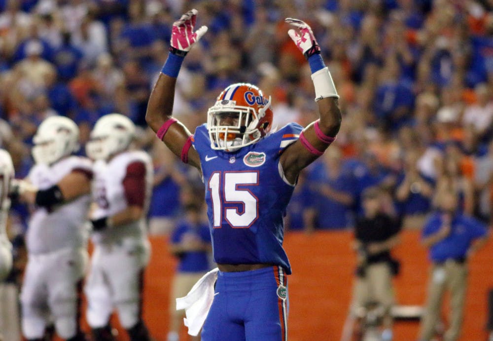 <p>Florida cornerback Loucheiz Purifoy gestures to the crowd during the Gators' 30-10 win against the Razorbacks on Oct. 5 in Ben Hill Griffin Stadium. With Purifoy leaving for the NFL Draft, the Gators have had to try to fill his role in the recruiting class.</p>