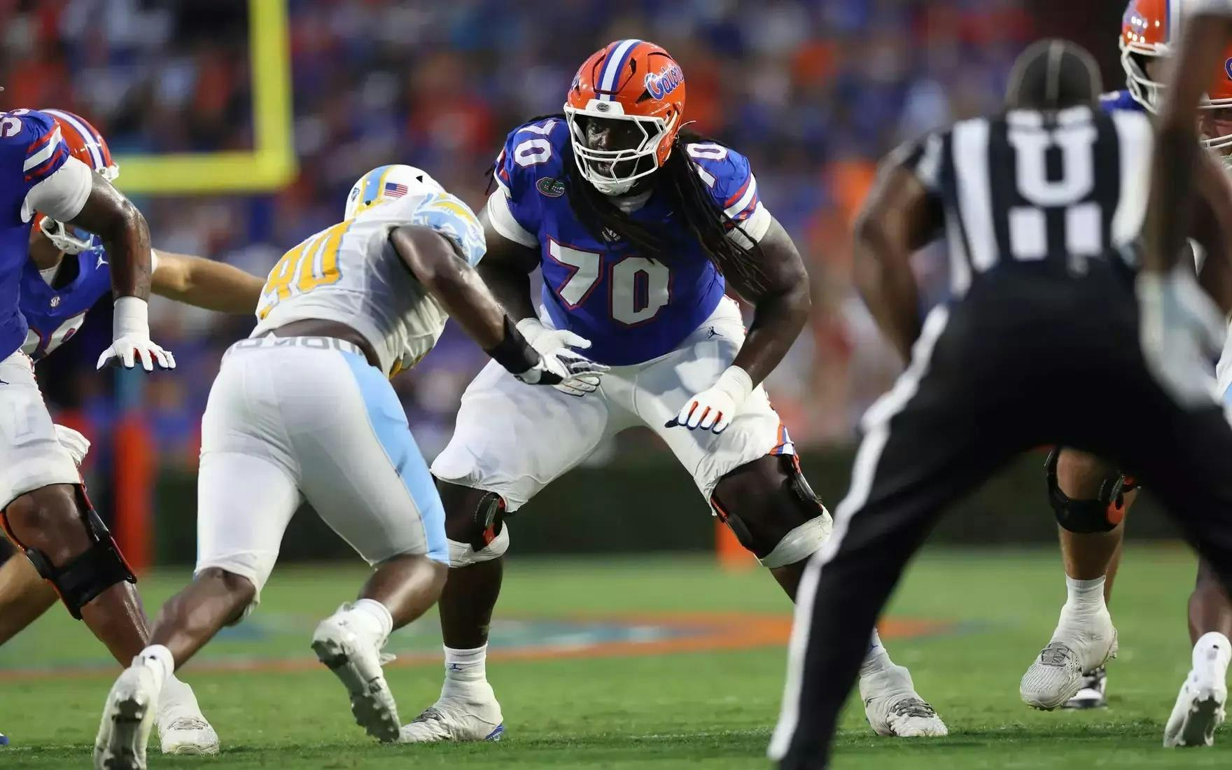Gators guard Damieon George Jr. (70) blocks a defender against the Long Island Sharks at Ben Hill Griffin Stadium on Saturday, Aug. 30, 2025. 