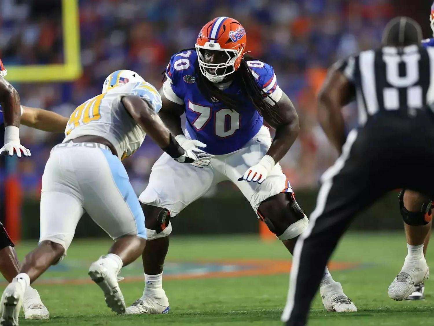 Gators guard Damieon George Jr. (70) blocks a defender against the Long Island Sharks at Ben Hill Griffin Stadium on Saturday, Aug. 30, 2025.