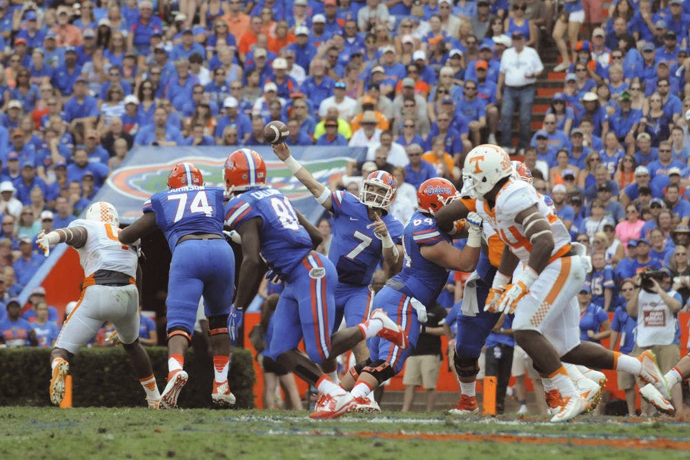 <p>UF quarterback Will Grier passes during Florida's 28-27 win against Tennessee on Sept. 26, 2015, at Ben Hill Griffin Stadium.</p>