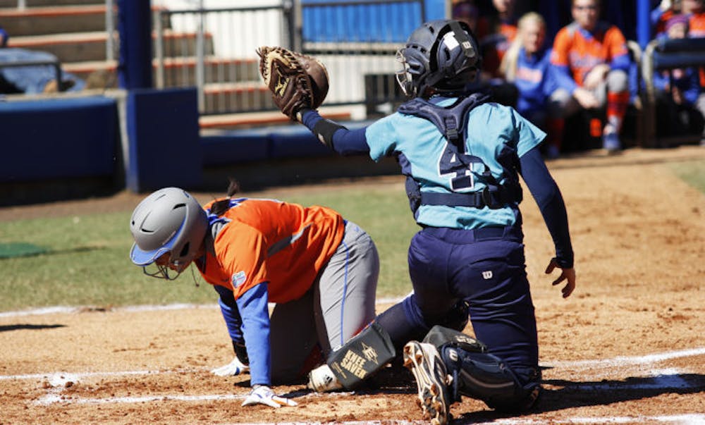 <p class="p1"><span class="s1">Kelsey Stewart gets tagged out at home during Florida’s 9-1 win against UNC Wilmington on Feb. 17 at Katie Seashole Pressly Stadium. Stewart picked up two hits in the Gators' 3-2 loss to Georgia on Friday.</span></p>