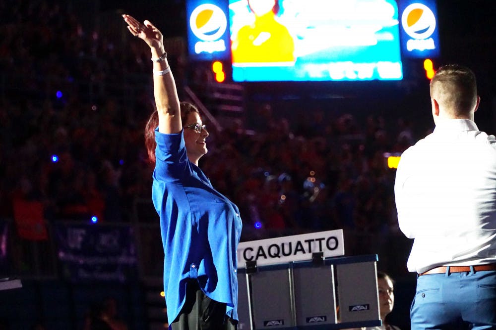 <p>UF coach Jenny Rowland waves to the crowd prior to Florida’s win against UCLA on Jan. 15, 2016, in the O’Connell Center.</p>