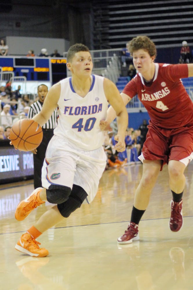 Freshman guard Sydney Moss (40) drives to the basket during Florida 69-58 win against Arkansas on Feb. 28 in the O’Connell Center.