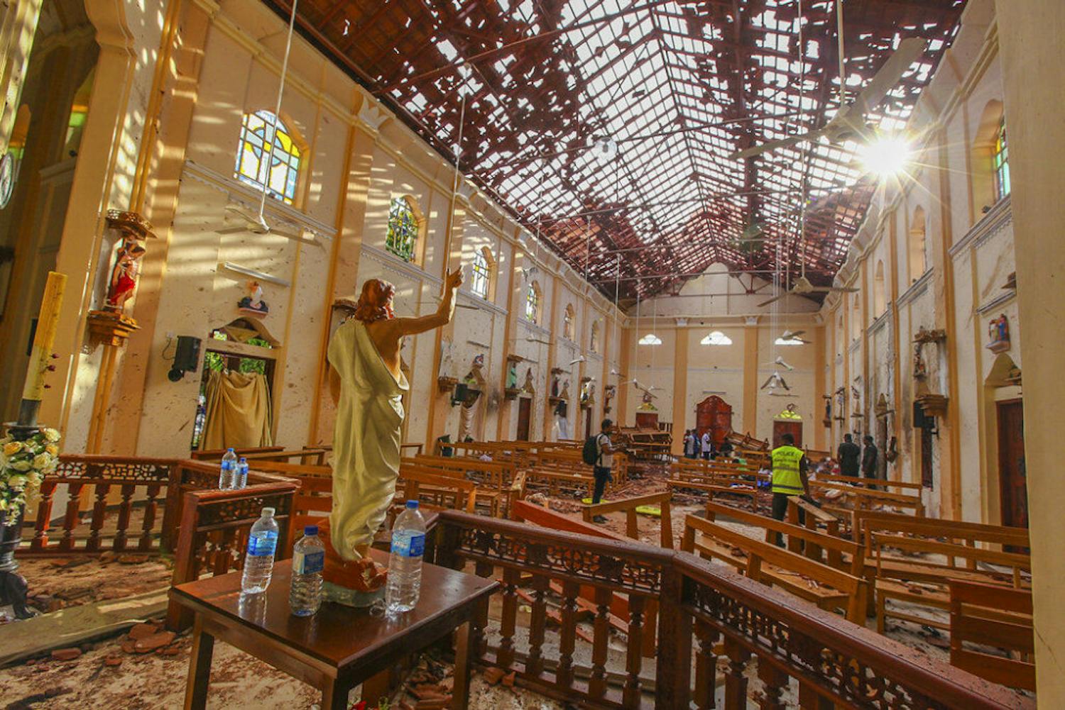 A view of St. Sebastian's Church damaged in blast in Negombo, north of Colombo, Sri Lanka, Sunday, April 21, 2019. More than hundred were killed and hundreds more hospitalized with injuries from eight blasts that rocked churches and hotels in and just outside of Sri Lanka's capital on Easter Sunday, officials said, the worst violence to hit the South Asian country since its civil war ended a decade ago. (AP Photo/Chamila Karunarathne)