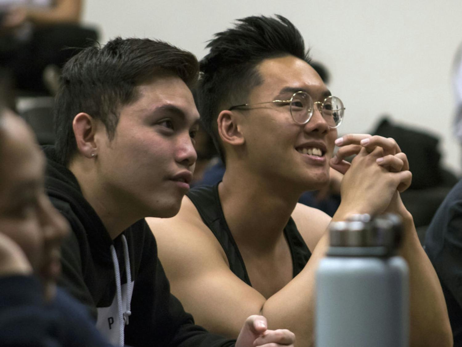 Tuan Nguyen, a 21-year-old biology junior, and Daniel Nguyen, a 22-year-old economics junior, attend a meeting in Little Hall Wednesday evening for the UF Vietnamese Students Organization. Both students said they joined the club their freshman year to form a better connection with their culture and meet new people.