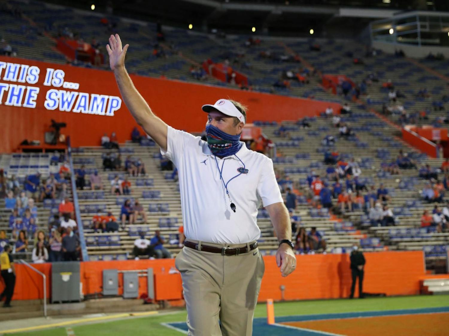 Gators Coach Dan Mullen greets fans prior to Florida's home game against Mizzou Oct. 31. UF beat the Georgia Bulldogs for the first time with Mullen at the helm on Saturday.