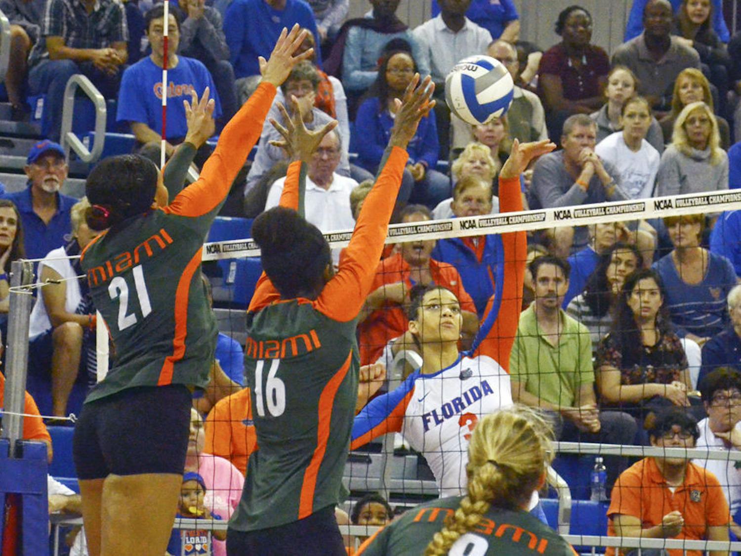 Right-side hitter Alex Holston swings for a kill during Florida's 3-1 win against Miami in the second round of the NCAA Tournament on Dec. 6 in the O'Connell Center.