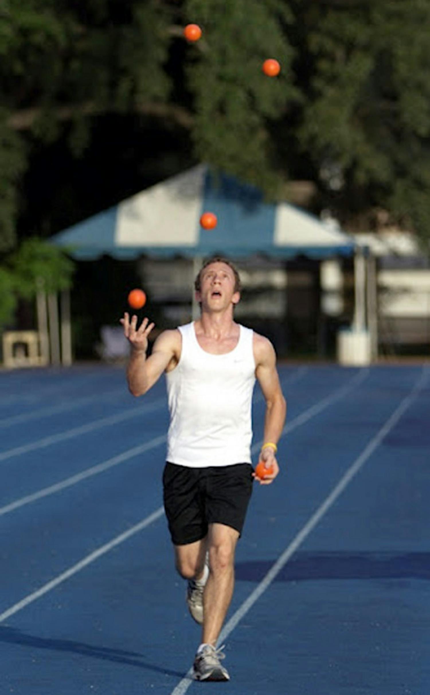UF junior Matthew Feldman broke the Guinness World Record for five-ball joggling at Rice University Friday.