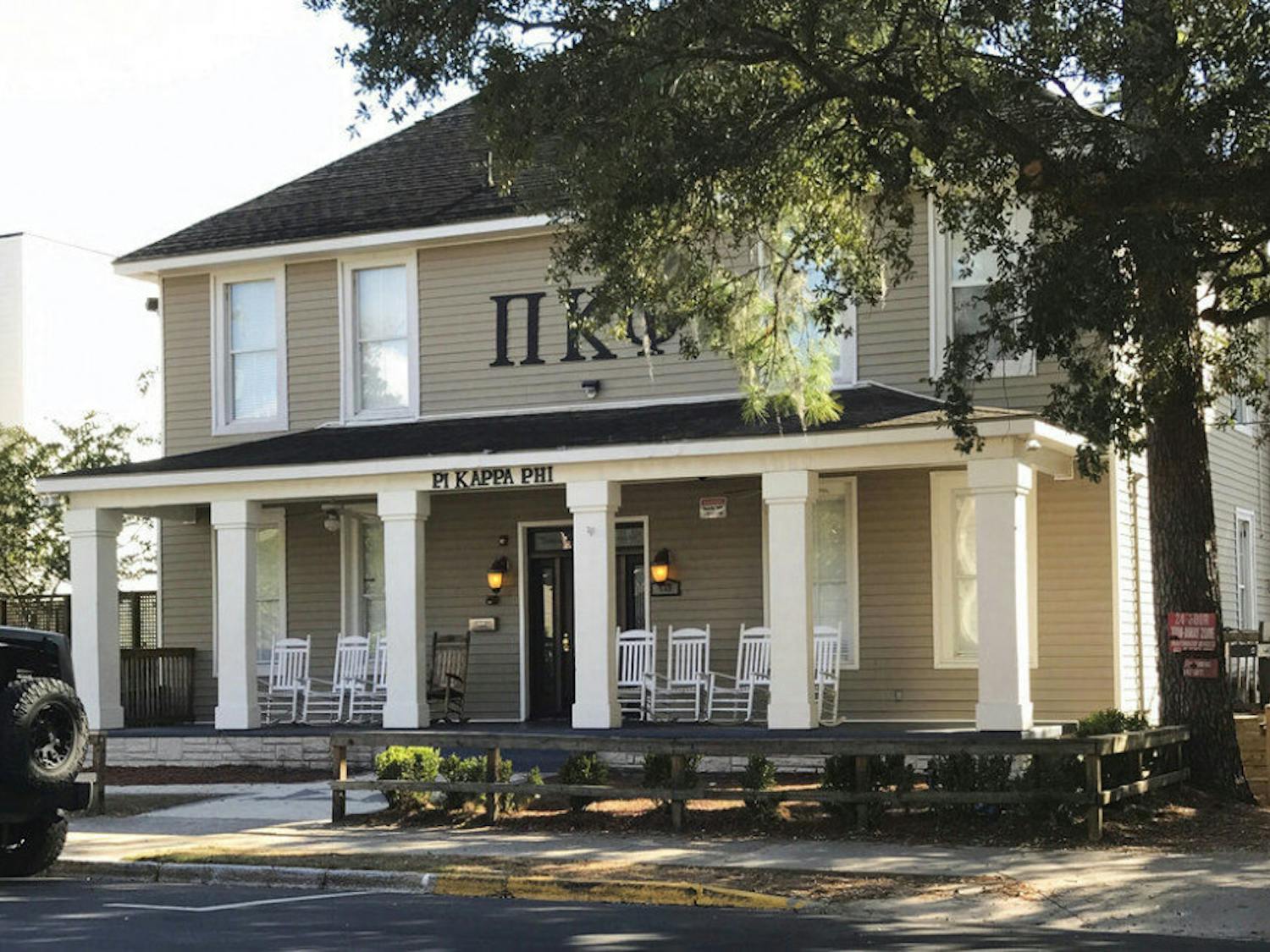 FILE - This Nov. 7, 2017 file photo shows the Pi Kappa Phi fraternity house near Florida State University in Tallahassee, Fla. Andrew Coffey should have been graduating from Florida State University with his classmates this May 2019, but his life was cut short when he was pressured into drinking an entire bottle of 101-proof Wild Turkey bourbon in a Pi Kappa Phi fraternity hazing ritual. Now his parents are pleading the Florida Legislature to pass a bill that expands the state's anti-hazing laws. (AP Photo/Joseph Reedy, file)