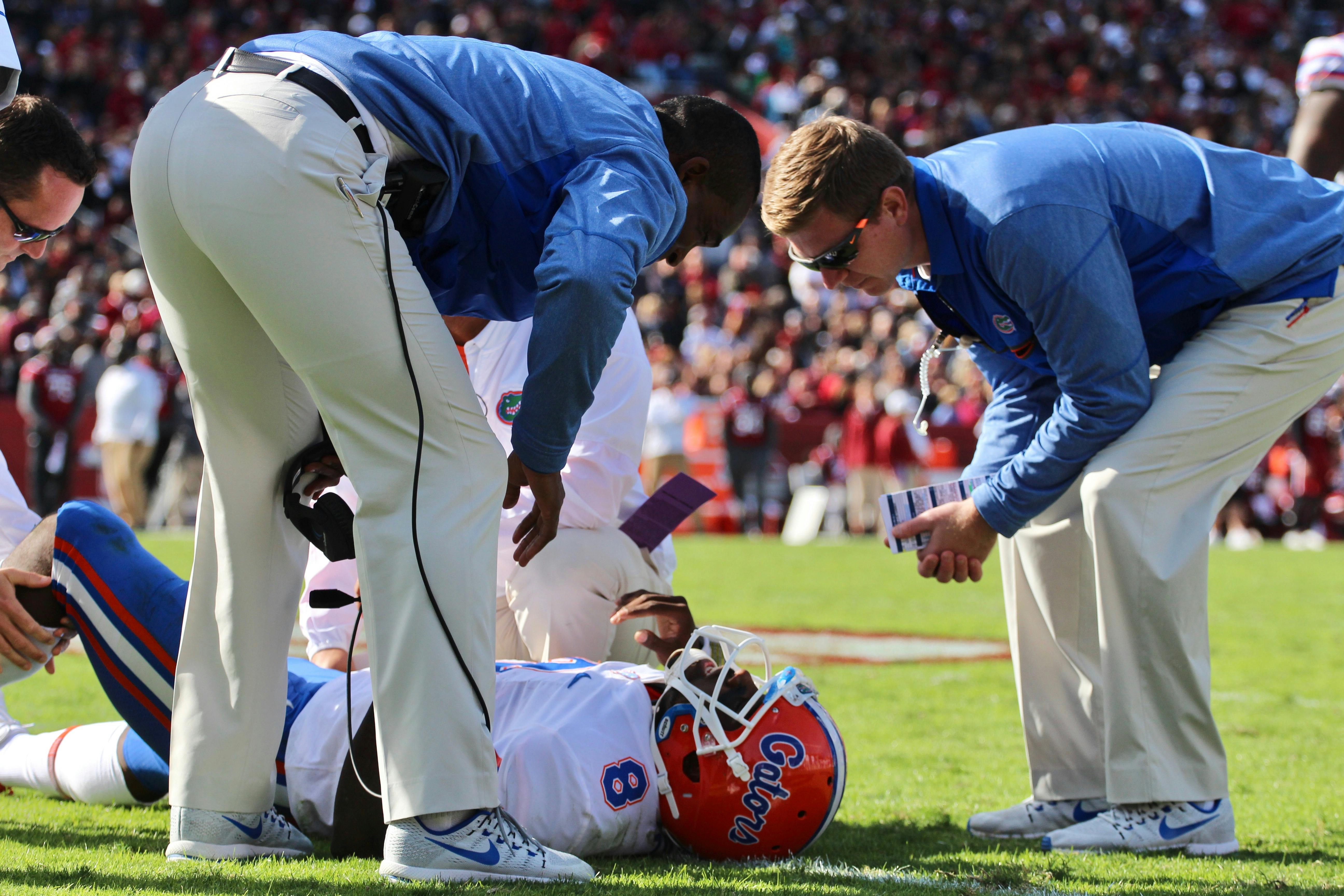 Malik Zaire injured his knee during Saturday's 28-20 loss to South Carolina at Williams-Brice Stadium. After the initial injury, Zaire returned to the game two plays earlier, only to crumble after taking the snap and shifting his weight to left leg.