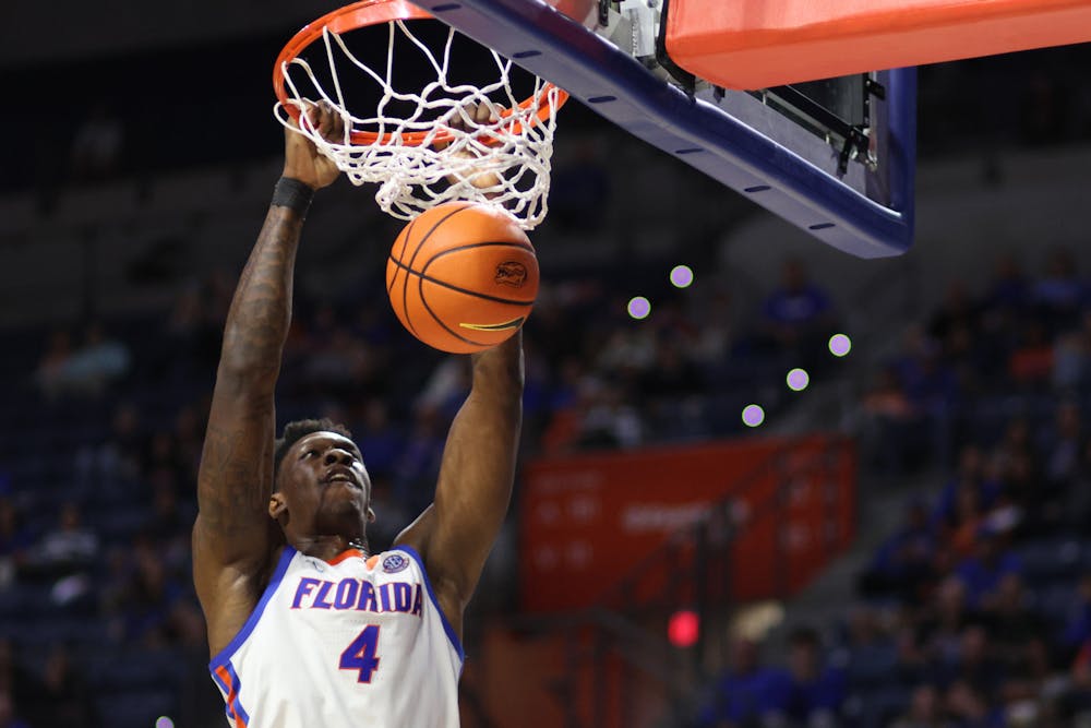 Florida graduate student forward Tyrese Samuel dunks the ball in the Gators' 77-57 home win over the Merrimack Warriors on Tuesday, Dec. 5, 2023.
