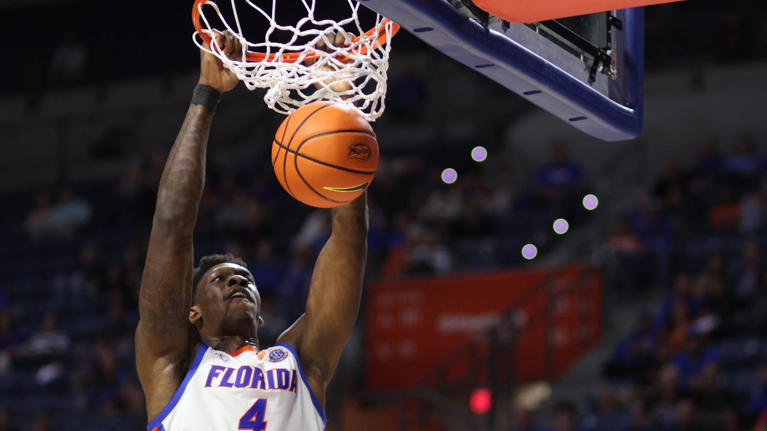 Florida graduate student forward Tyrese Samuel dunks the ball in the Gators' 77-57 home win over the Merrimack Warriors on Tuesday, Dec. 5, 2023.