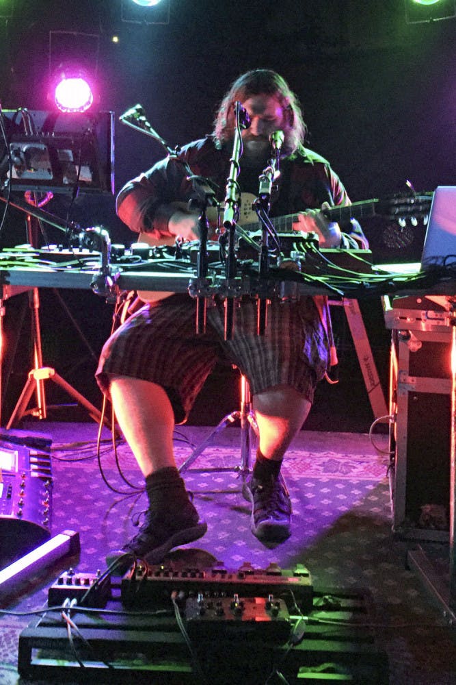 Zach Deputy, a Savannah, Georgia-based musician, plays at The JAM on Thursday night. Known for his audio-looping skills, Deputy played guitar while recording loops on the spot.