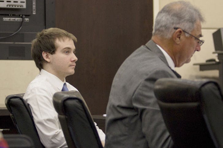 Pedro Bravo sits with his counsel in the Alachua County Courthouse on Monday, the first day of his trial. Bravo is accused of first-degree murder, kidnapping, poisoning, mishandling human remains and giving false reports.