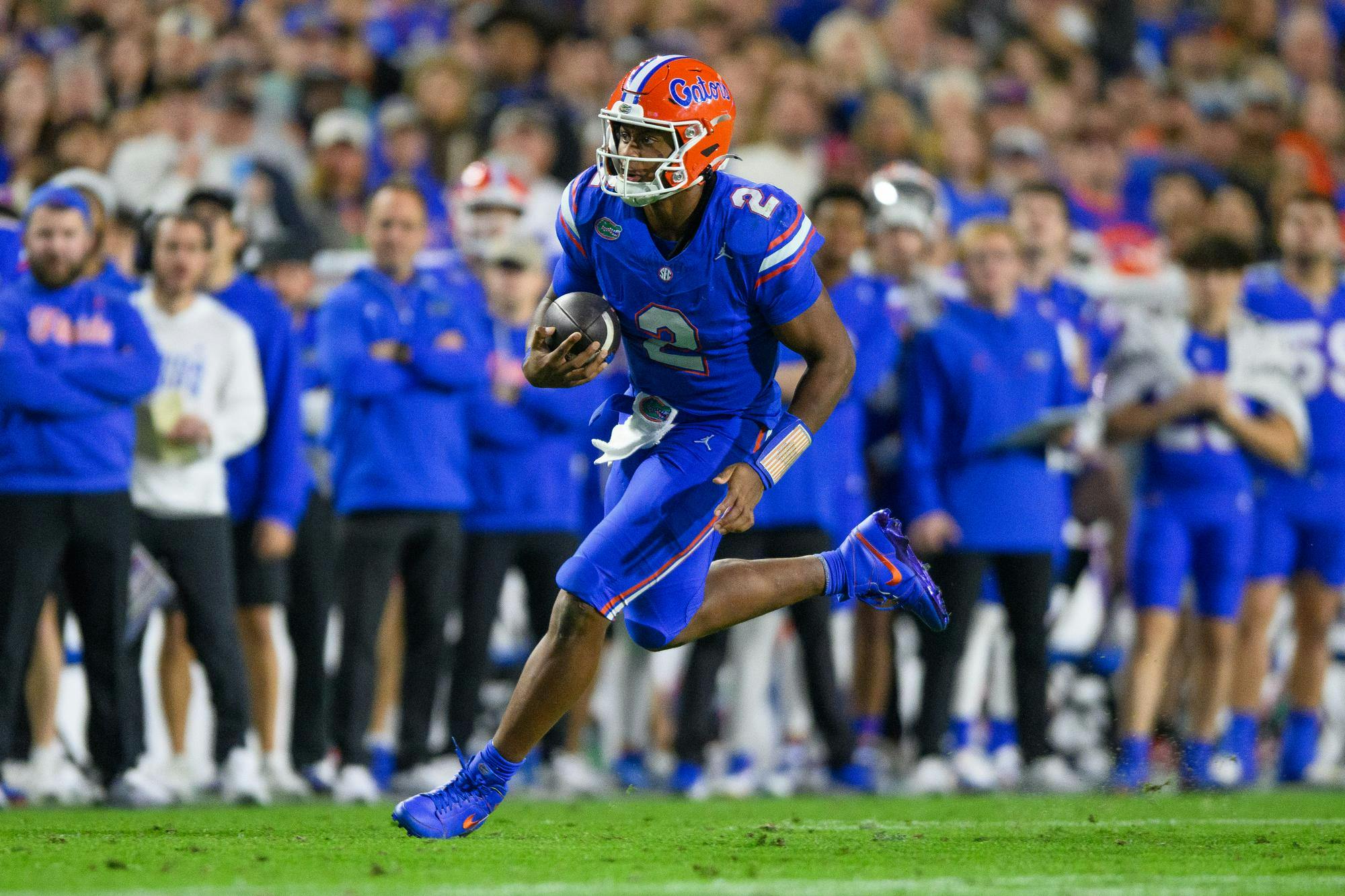 Florida quarterback DJ Lagway (2) rushes during the second half of an NCAA college football game against Florida State, Saturday, Nov. 29, 2025, at Ben Hill Griffin Stadium in Gainesville, Fla.