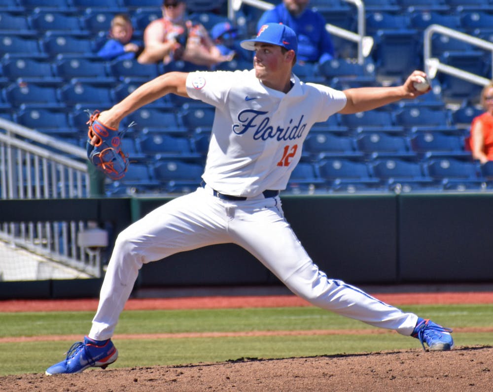 <p>Florida left-handed pitcher Hunter Barco pitches against Jacksonville on March 14, 2021.</p>
