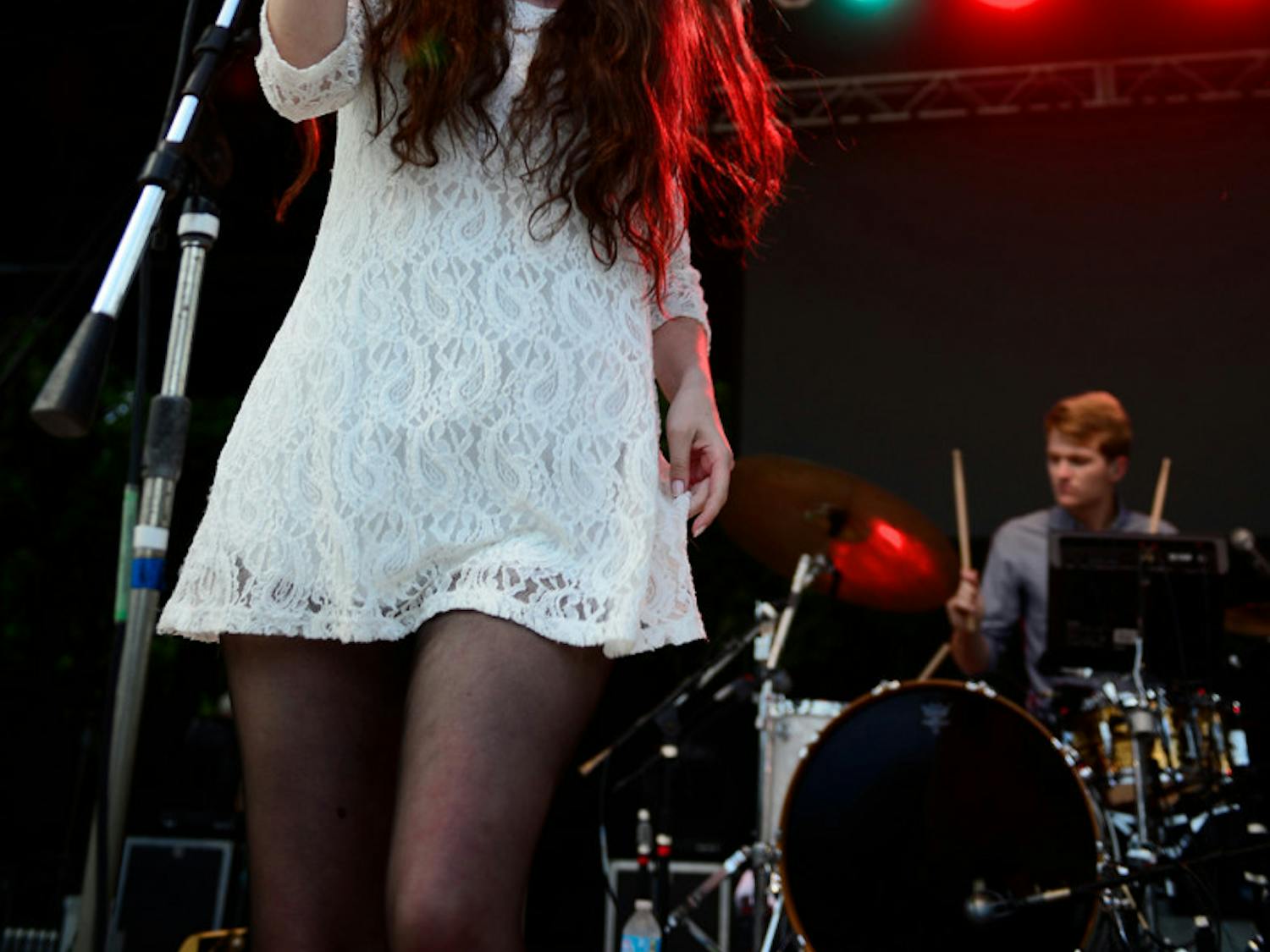 Madeline Follin, of Cults, sings on Friday during Swampfest 2013. Cults opened, along with the band Ahmir for Matt and Kim, whose performance was canceled due to thunderstorms.